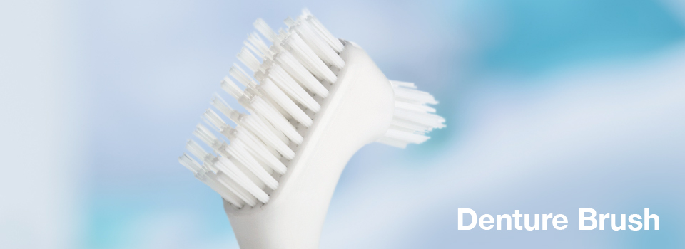 Use a denture brush to optimise your denture health and hygiene